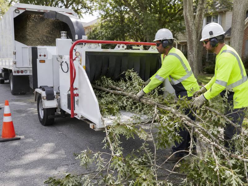A chipper running during cleanup after a job